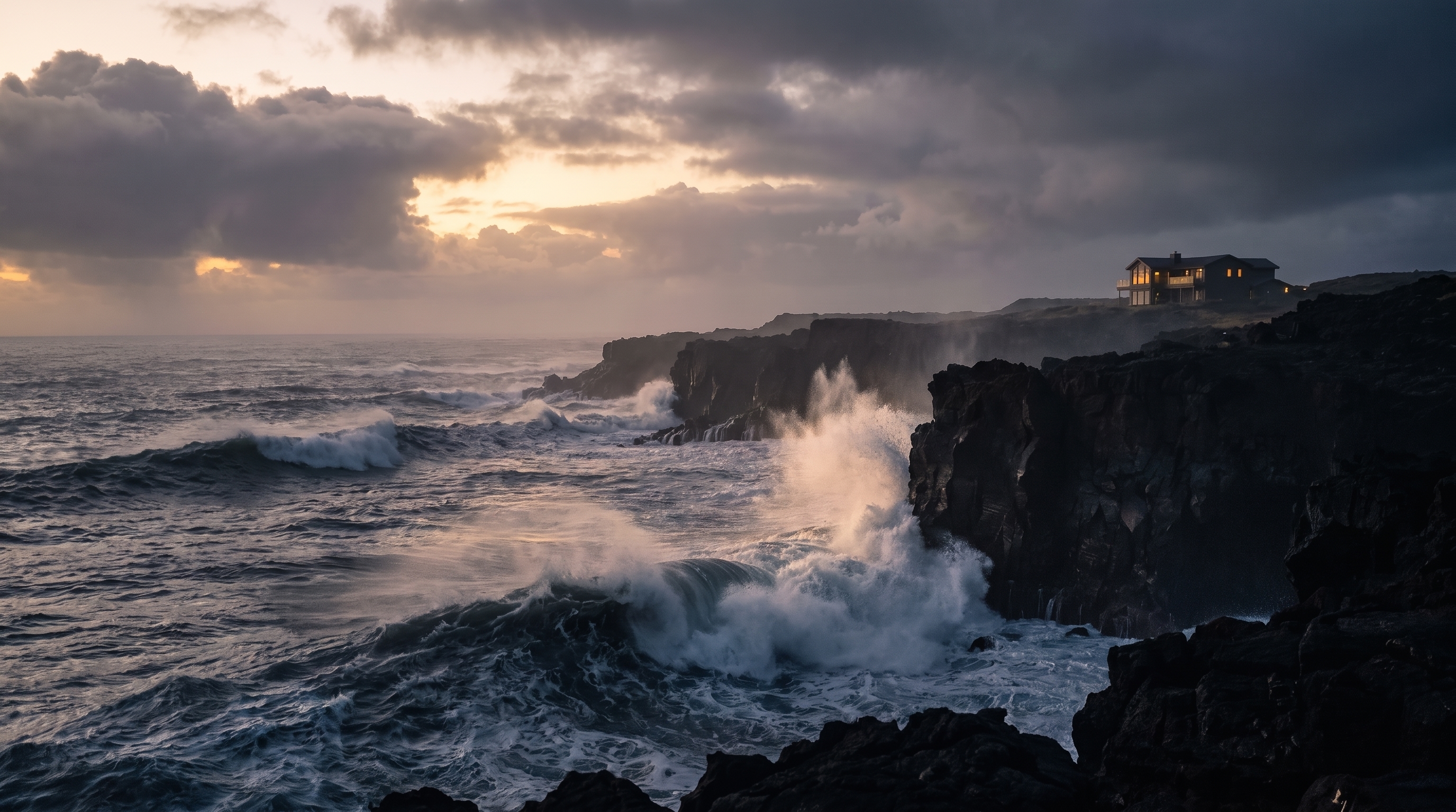 Dramatic ocean waves crashing against volcanic cliffs