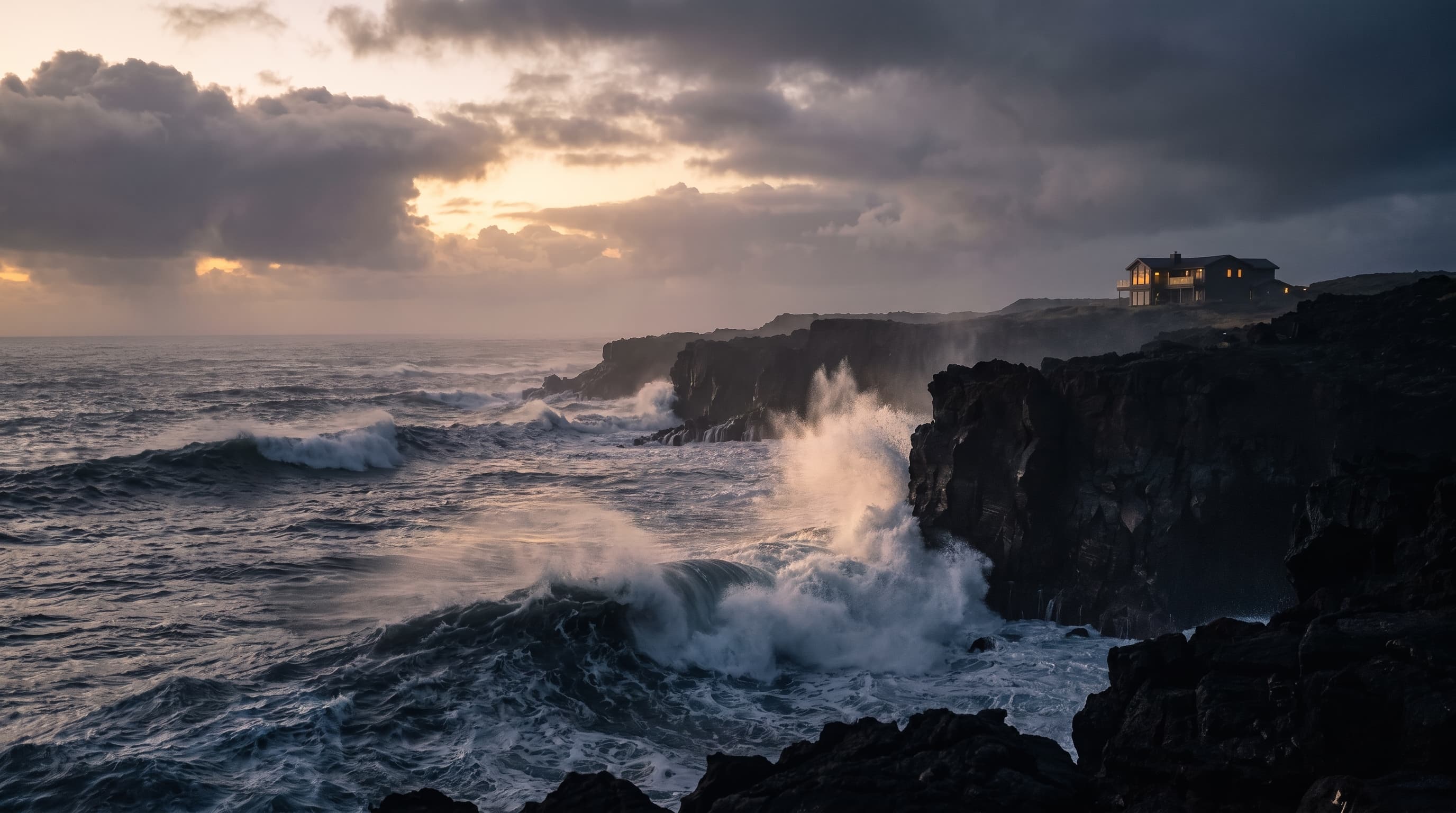 Dramatic ocean waves crashing against volcanic cliffs